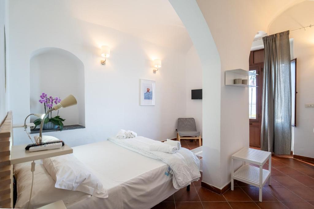 Postel nebo postele na pokoji v ubytování Casa Scala