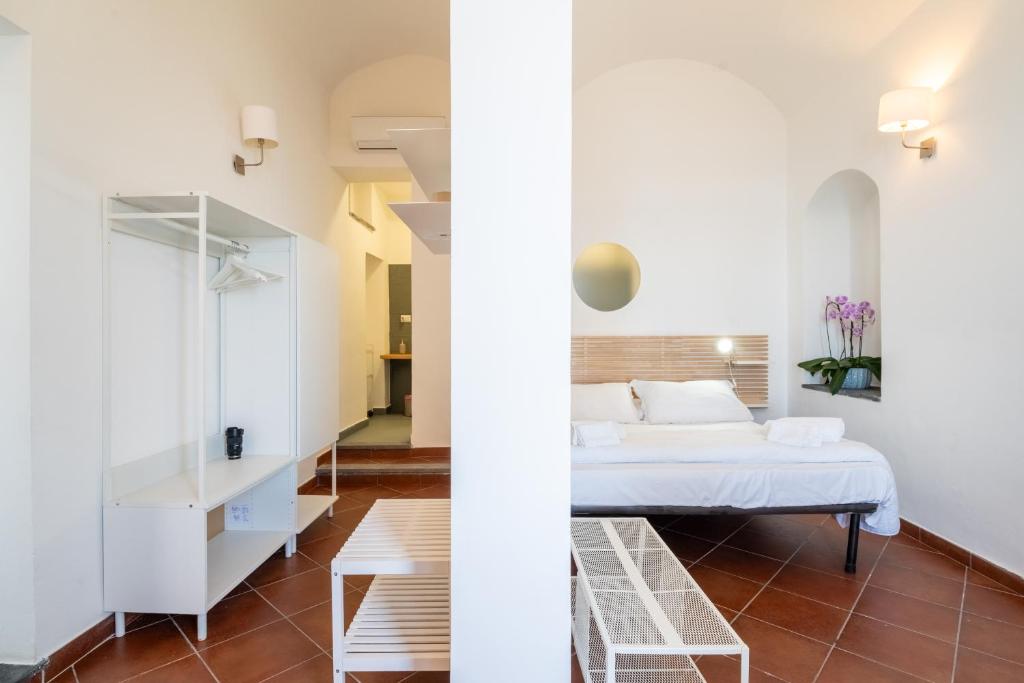 Postel nebo postele na pokoji v ubytování Casa Scala