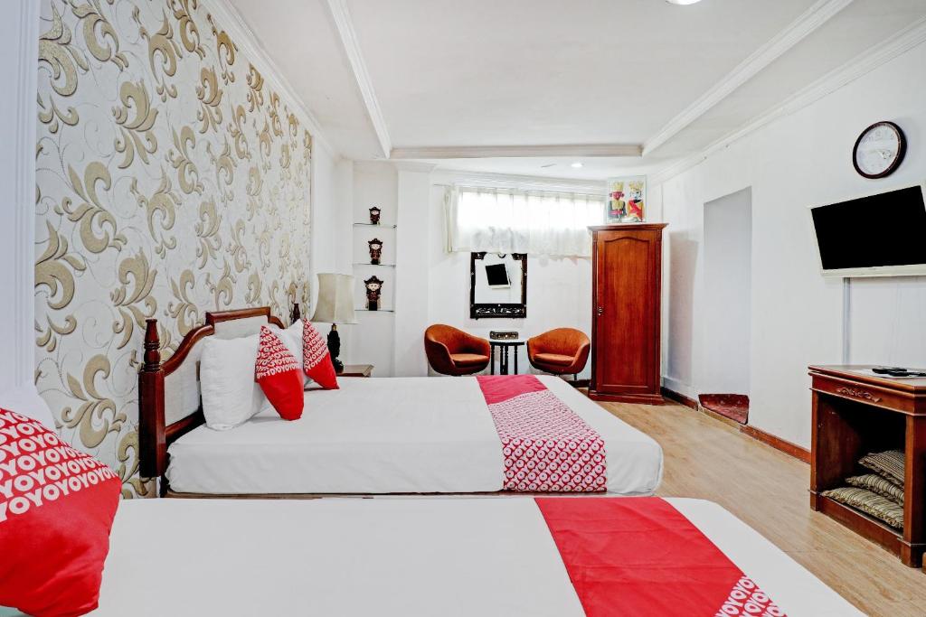 Voodi või voodid majutusasutuse Hotel O Bandung near Stadion Siliwangi formerly The Ethnic Hotel Bandung toas