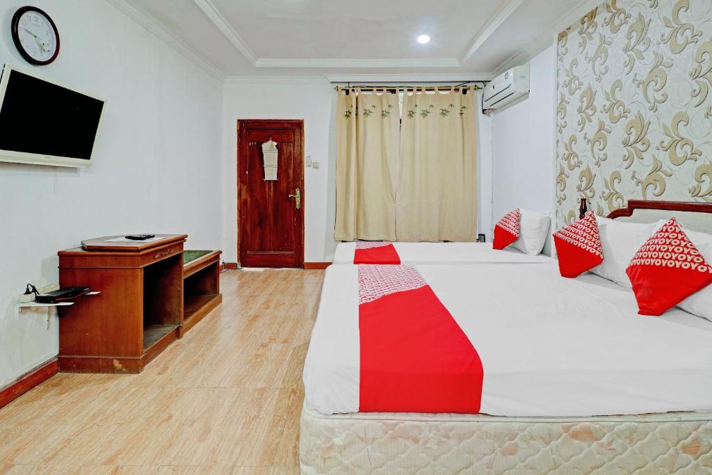 Voodi või voodid majutusasutuse Hotel O Bandung near Stadion Siliwangi formerly The Ethnic Hotel Bandung toas