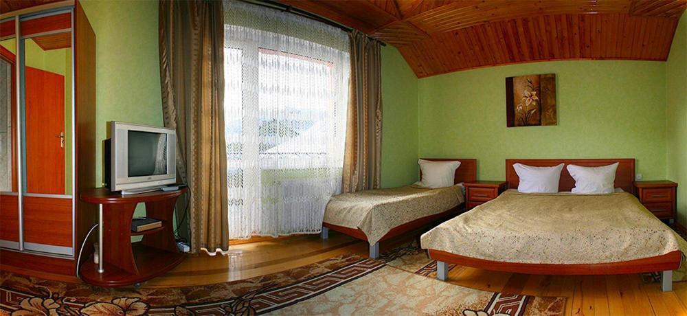Postel nebo postele na pokoji v ubytování Zoriana