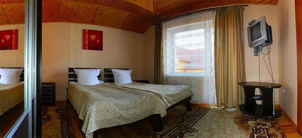 Postel nebo postele na pokoji v ubytování Zoriana