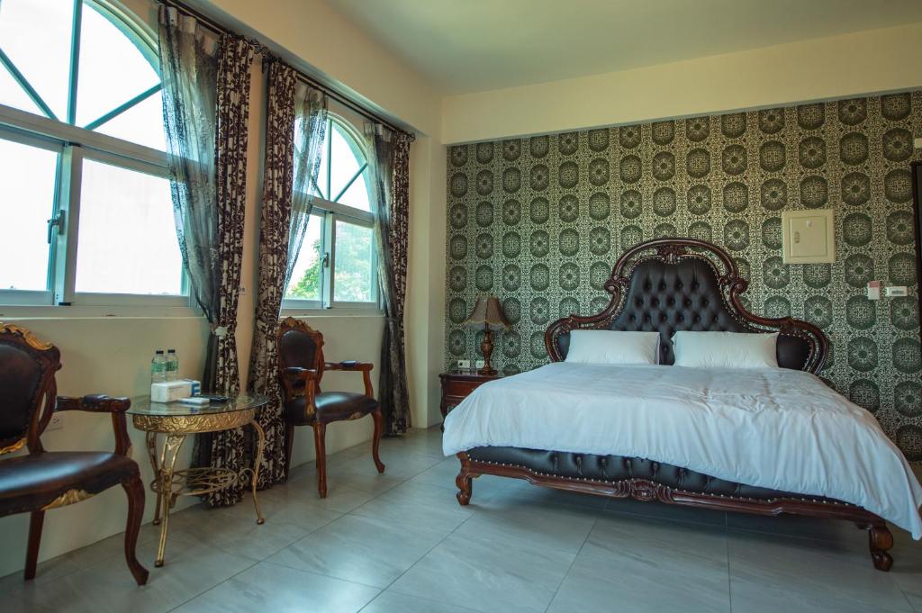 Posteľ alebo postele v izbe v ubytovaní Ding Shian B&B