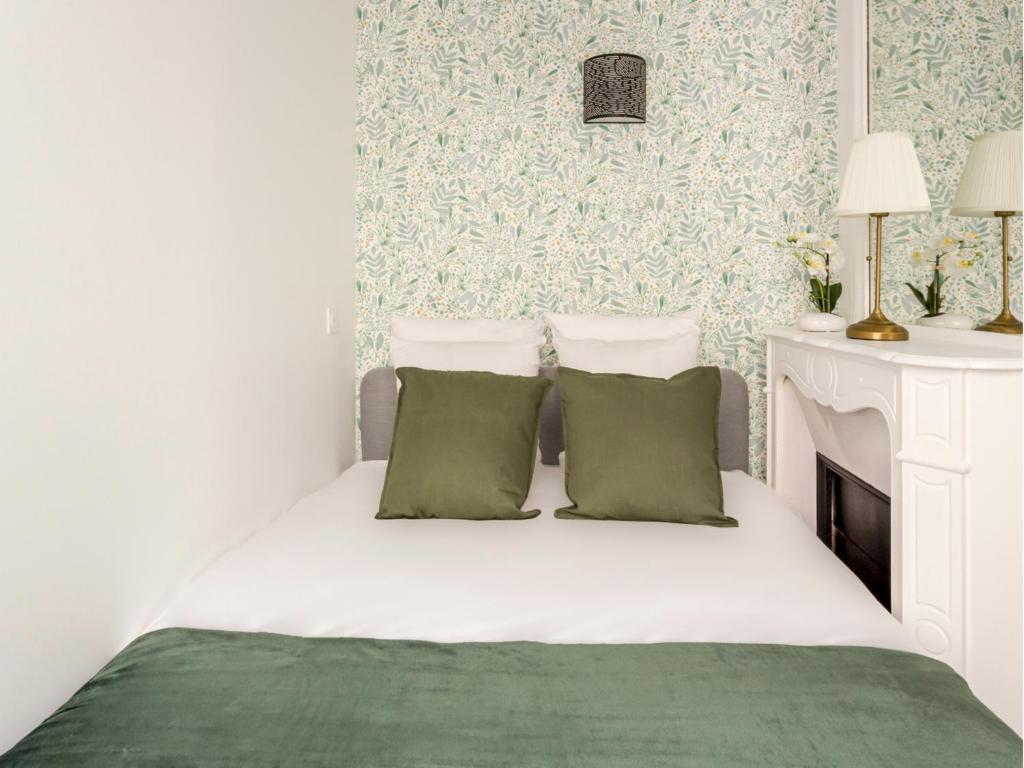 Posteľ alebo postele v izbe v ubytovaní Merveil - Family Suite - Champs Elysees - Wagram