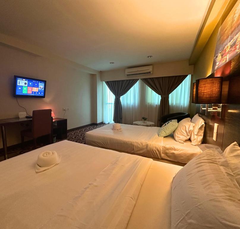 Letto o letti in una camera di Ming Greenage Suite 明绿时代套房 @Kota Kinabalu 亚庇市中心