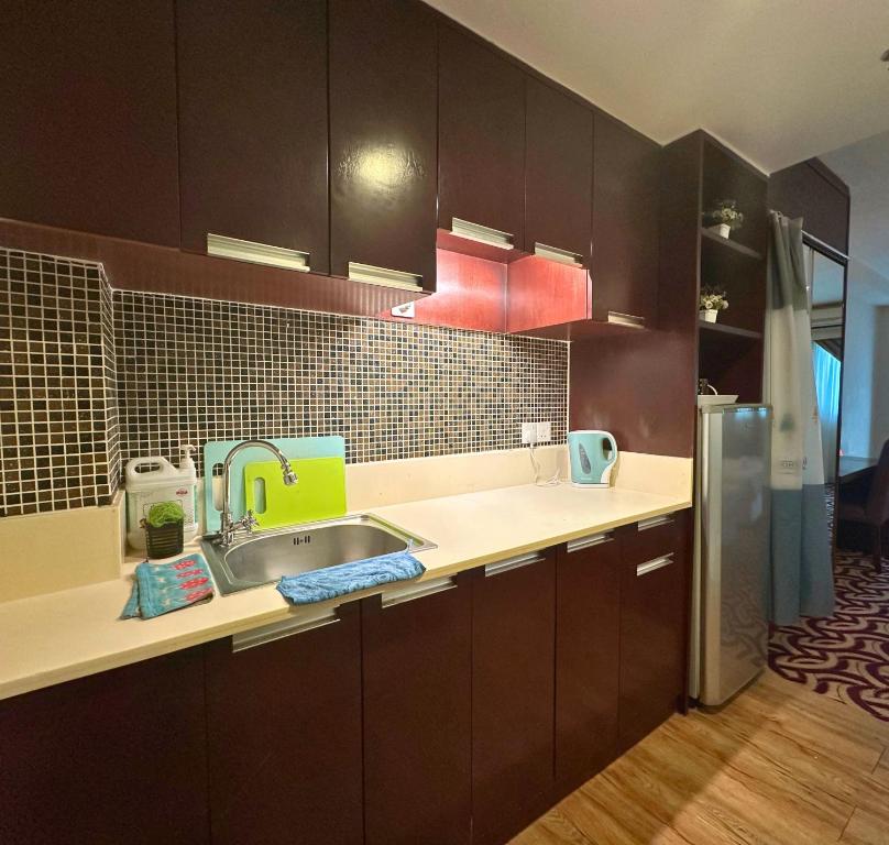 Cucina o angolo cottura di Ming Greenage Suite 明绿时代套房 @Kota Kinabalu 亚庇市中心