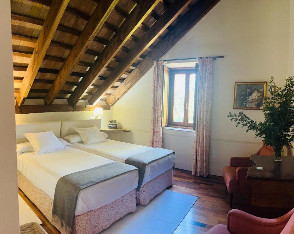 Posteľ alebo postele v izbe v ubytovaní Casa Viña de Alcántara