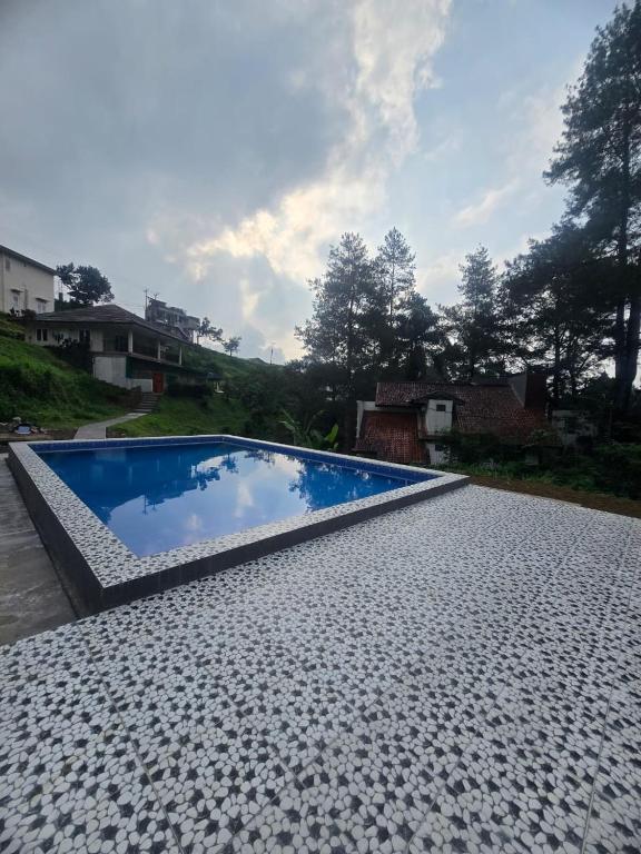 Bazén v ubytování Villa restu adel nebo v jeho okolí