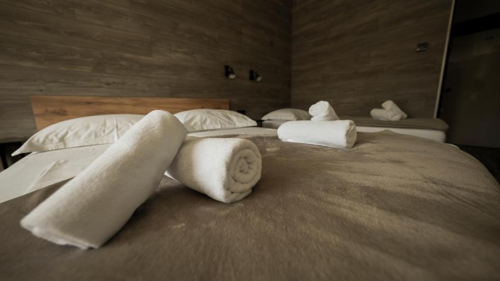 Postel nebo postele na pokoji v ubytování Hotel Matija Gubec