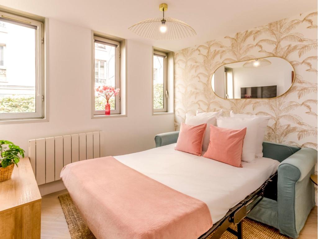 Posteľ alebo postele v izbe v ubytovaní Merveil - Family Suite - Tour Eiffel - Viala I