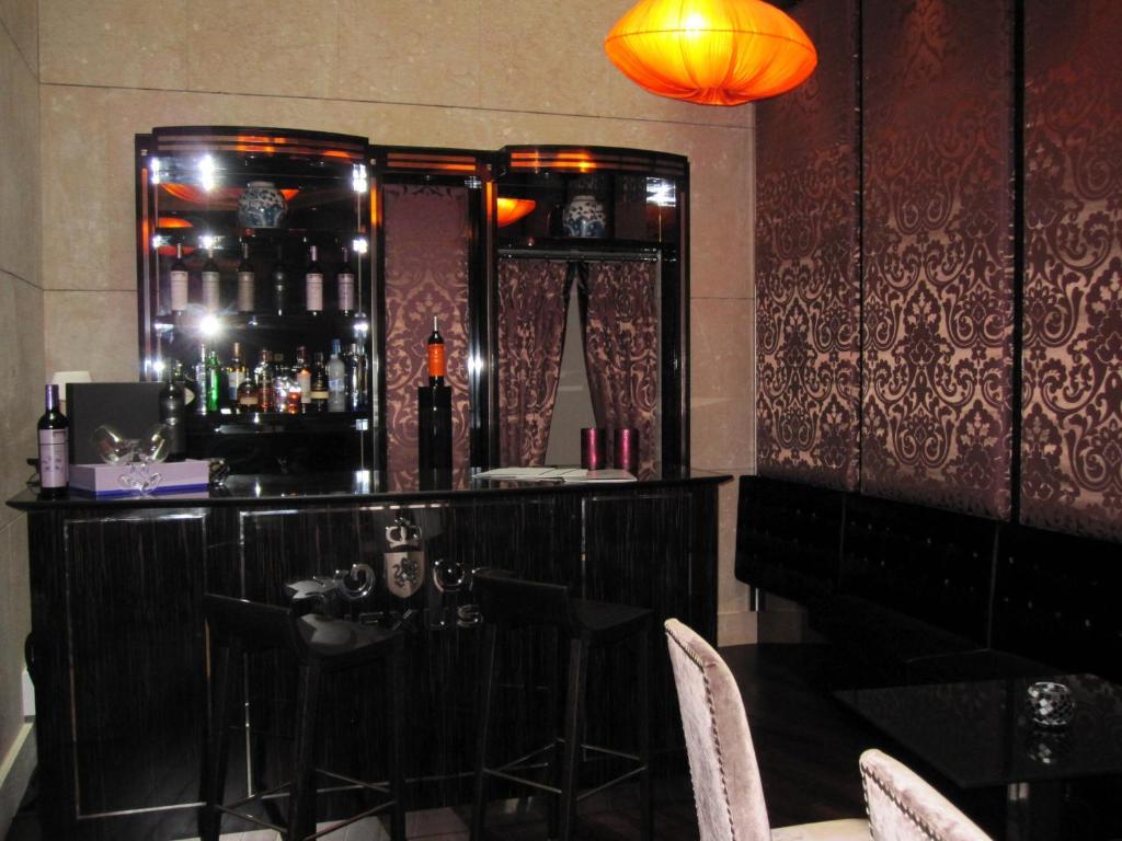 Lounge nebo bar v ubytování Nexus Valladolid Suites & Hotel