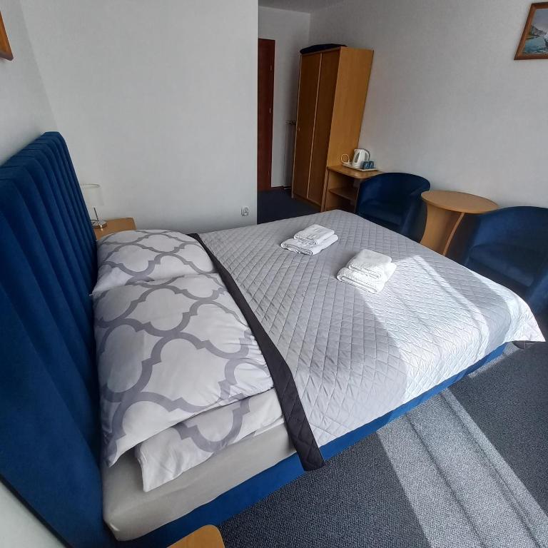 Postel nebo postele na pokoji v ubytování Akwen