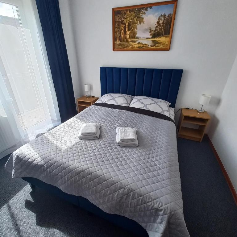 Postel nebo postele na pokoji v ubytování Akwen