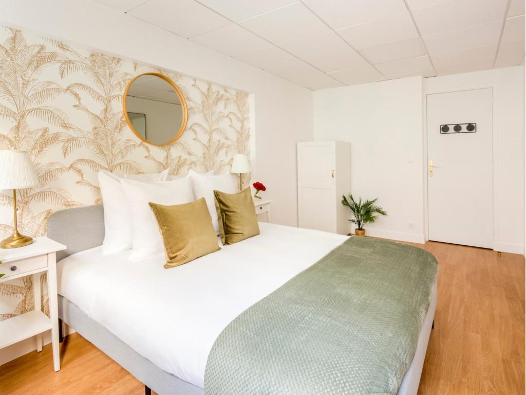 Posteľ alebo postele v izbe v ubytovaní Merveil - Family Suite - Marais - Pelee