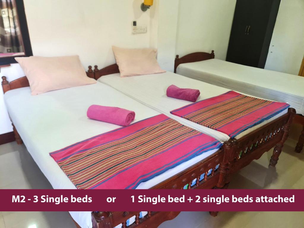 Postel nebo postele na pokoji v ubytování AHSRAM Accommodations