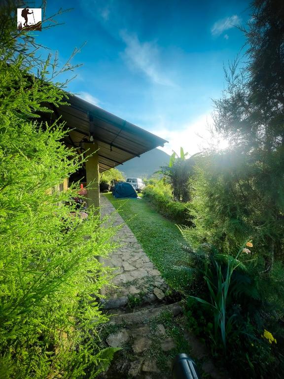 a house with a walkway leading to a yard at Royal Mountain Edge ,Knuckles in Rangala