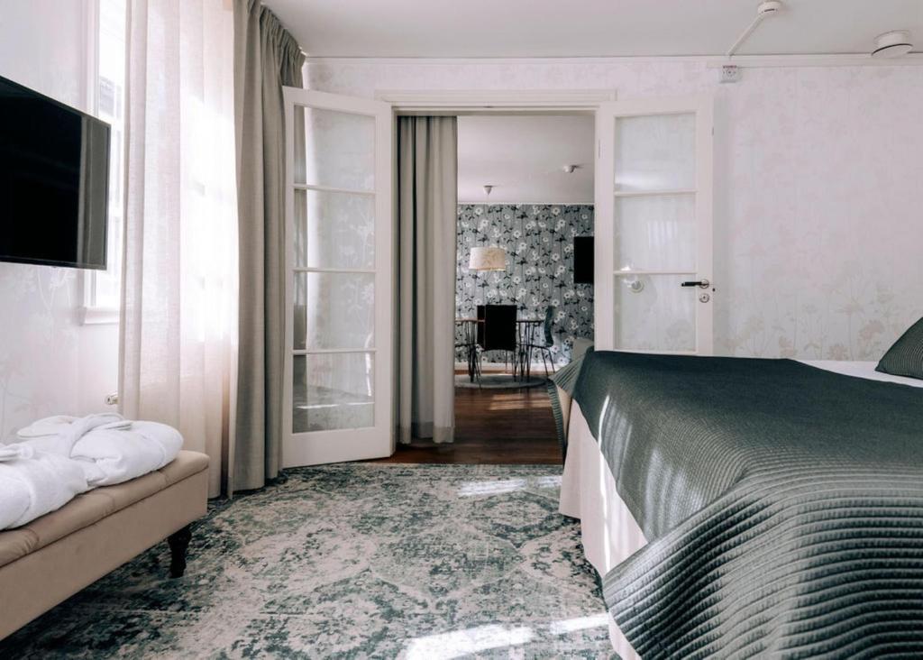 Postel nebo postele na pokoji v ubytování Best Western Plus Kalmarsund Hotell