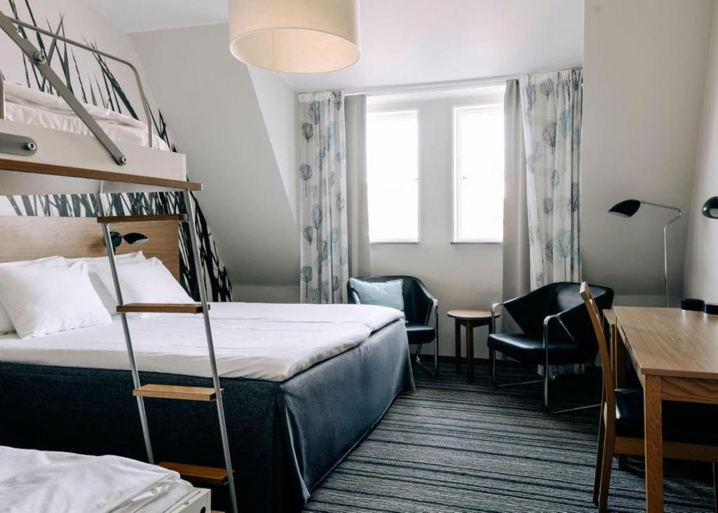 Postel nebo postele na pokoji v ubytování Best Western Plus Kalmarsund Hotell