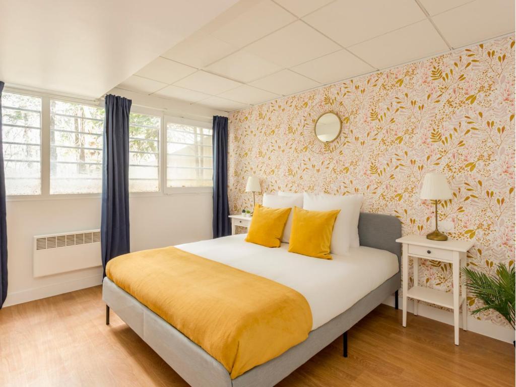 Posteľ alebo postele v izbe v ubytovaní Merveil - Family Suite - Marais - Pelee