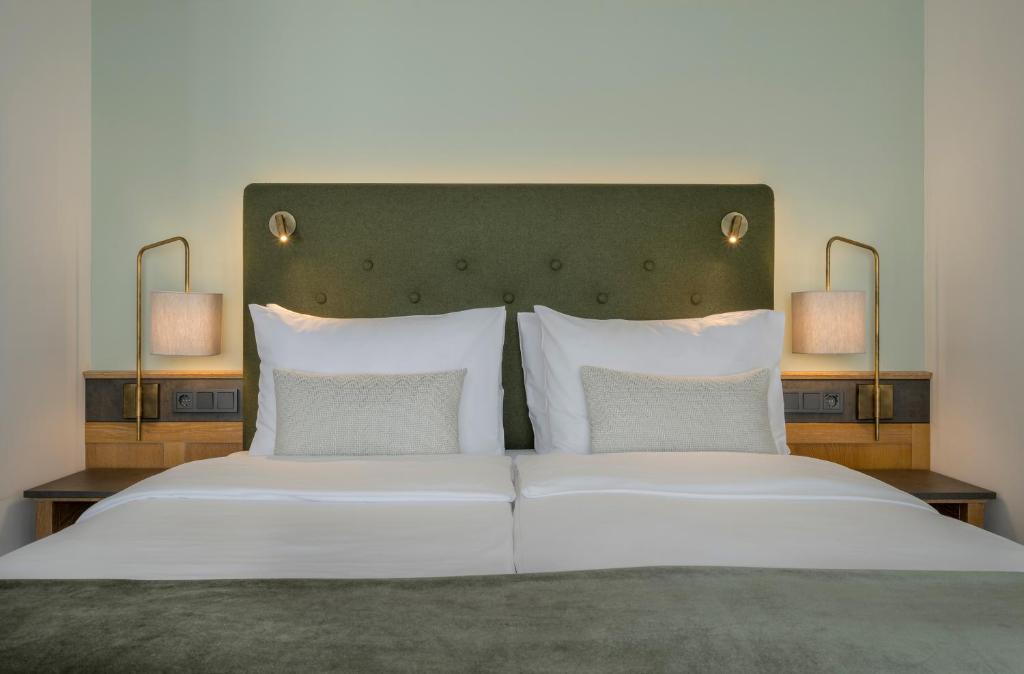 Posteľ alebo postele v izbe v ubytovaní Hotel IMLAUER & Bräu