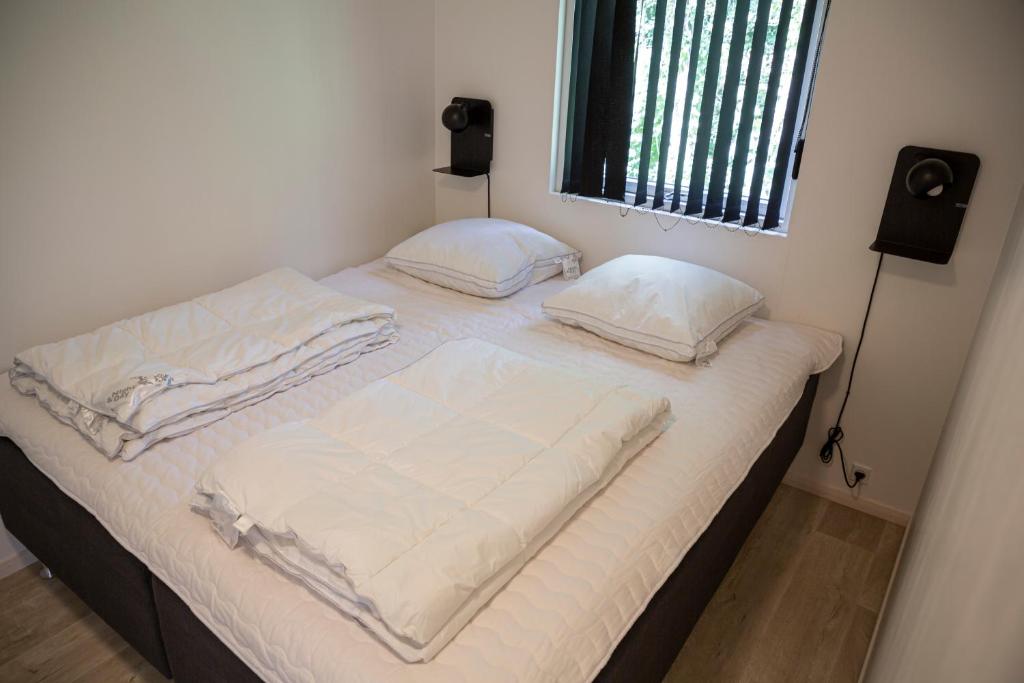 Postel nebo postele na pokoji v ubytování DCU-Camping Odense
