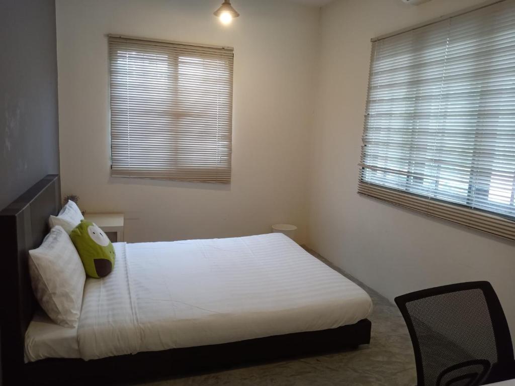 Postel nebo postele na pokoji v ubytování Chow Kit Neighborhood Hostel in Kuala Lumpur