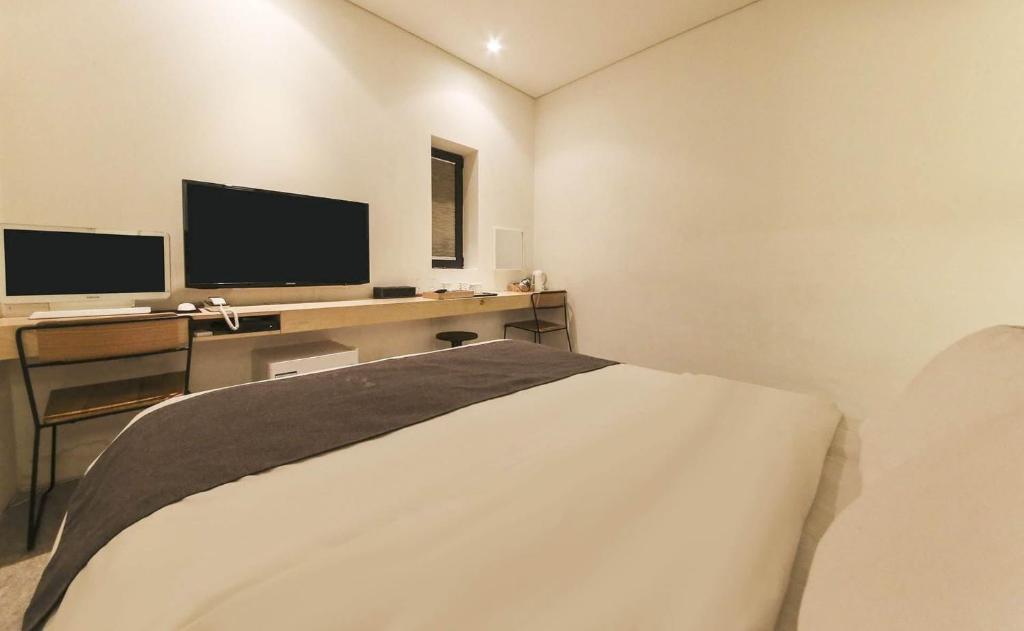 TV a/nebo společenská místnost v ubytování Ami Boutique Hotel, Yongin