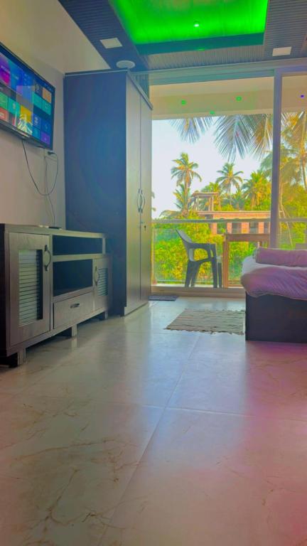 TV a/nebo společenská místnost v ubytování Seaside Stay
