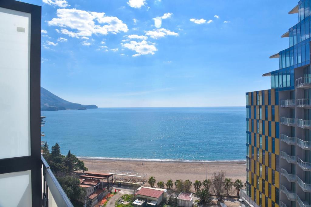 a view of the ocean from a building at CASA AL MARE RESIDENCE in Bečići