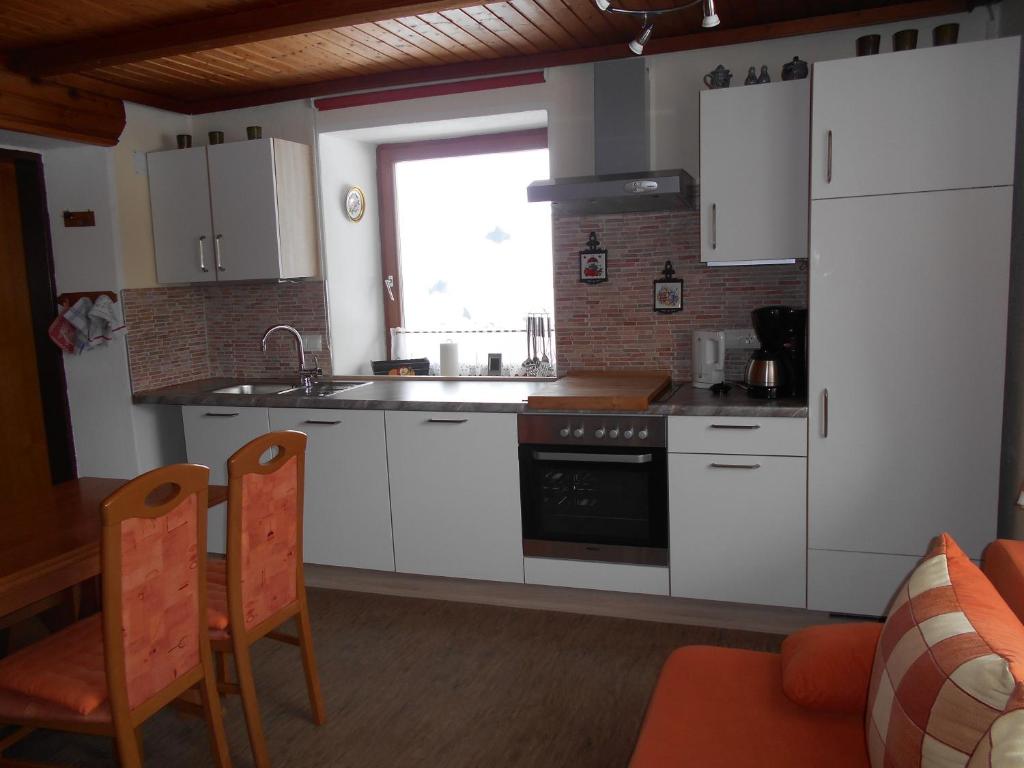 Kuchyň nebo kuchyňský kout v ubytování Haus Maria