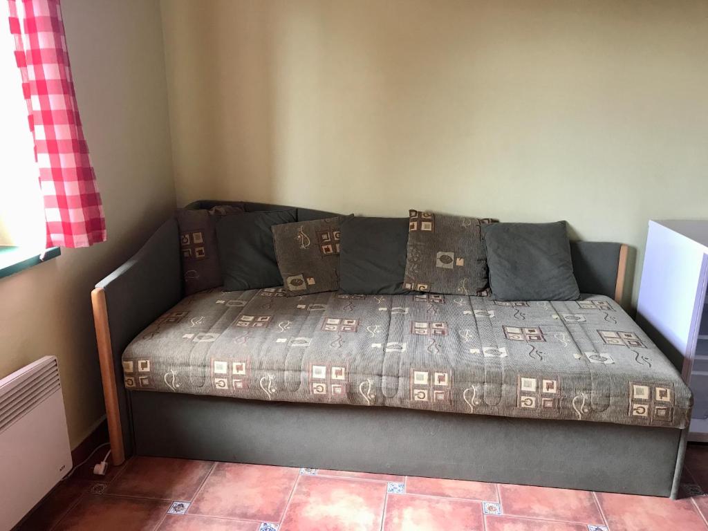Postel nebo postele na pokoji v ubytování Vinařský dům Sedlec