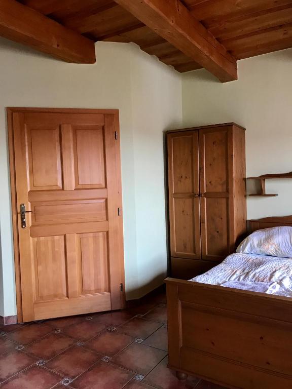 Postel nebo postele na pokoji v ubytování Vinařský dům Sedlec
