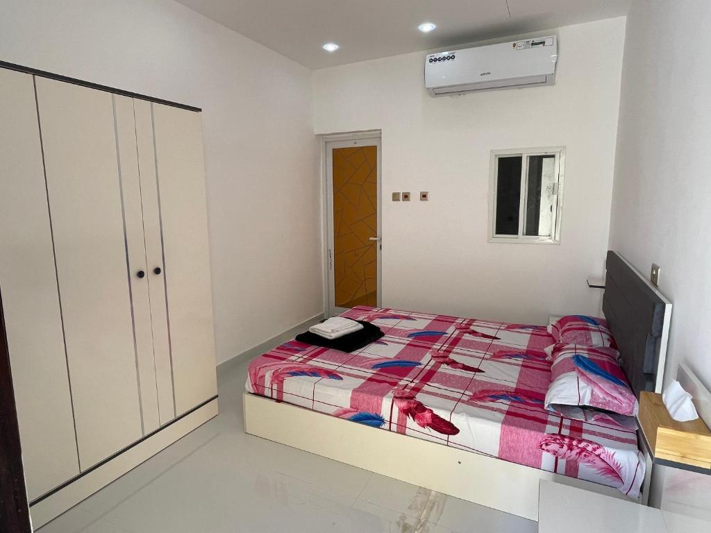 Llit o llits en una habitació de Garden Villa 2G