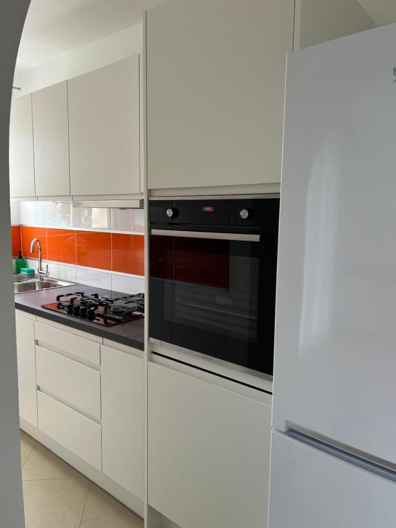 Kuchyň nebo kuchyňský kout v ubytování Apartments Jurić