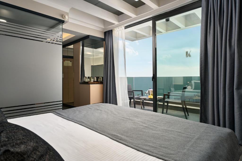 Postel nebo postele na pokoji v ubytování Kaila Beach Hotel - All Inclusive