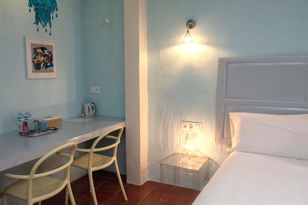 Postel nebo postele na pokoji v ubytování Boutique Hotel RifugioAzul