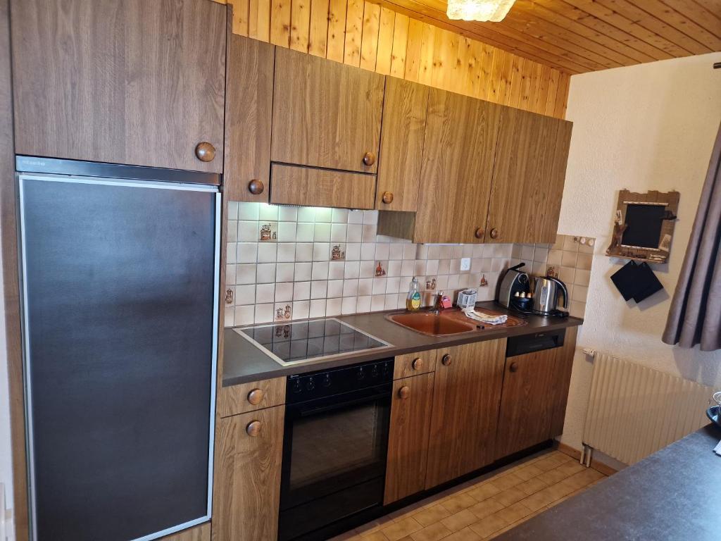 Kuchyň nebo kuchyňský kout v ubytování Les RHODOS 3