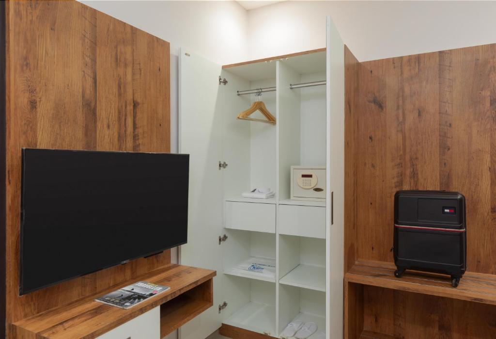 TV a/nebo společenská místnost v ubytování Kaira Park
