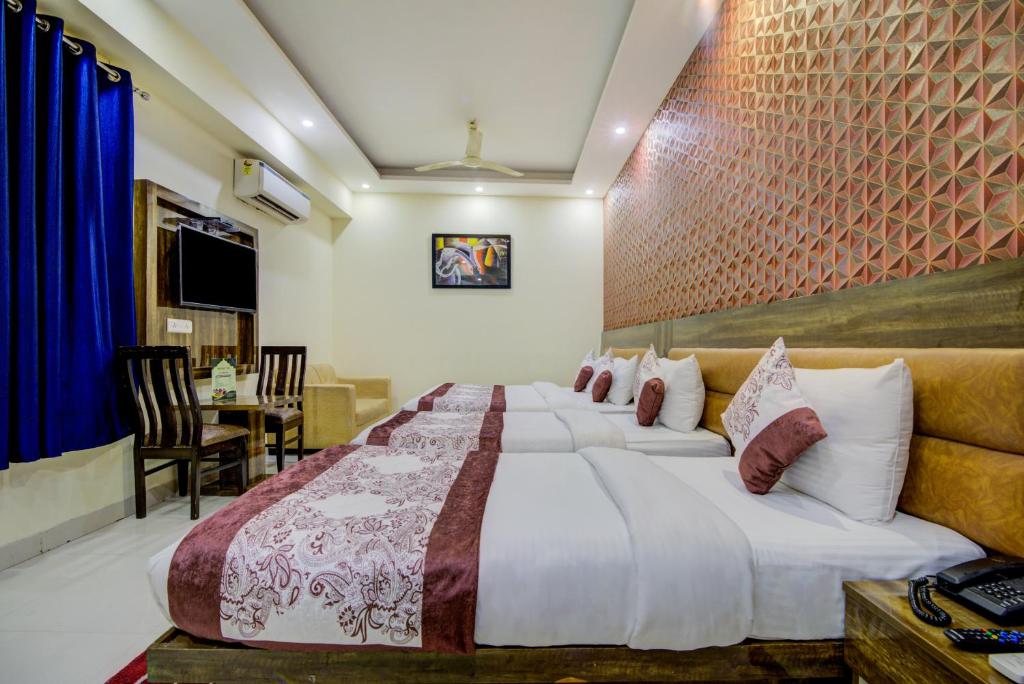 Letto o letti in una camera di Smart Lax Hotel By SMART GROUP