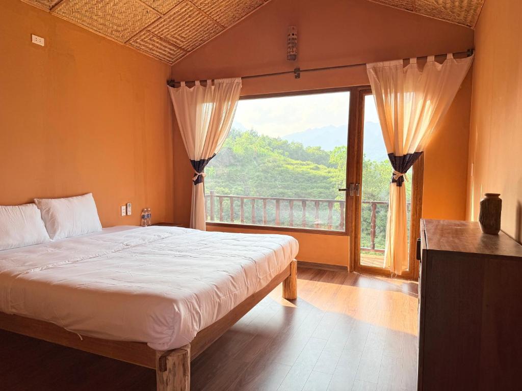 Postel nebo postele na pokoji v ubytování Du Gia Panorama Ecologde
