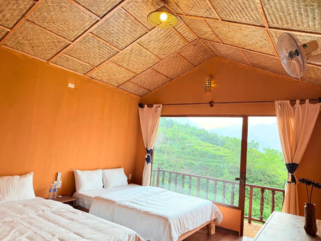 Postel nebo postele na pokoji v ubytování Du Gia Panorama Ecologde