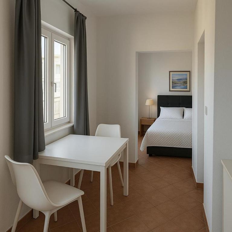 Postel nebo postele na pokoji v ubytování Marika Seaside Retreat-Drašnice