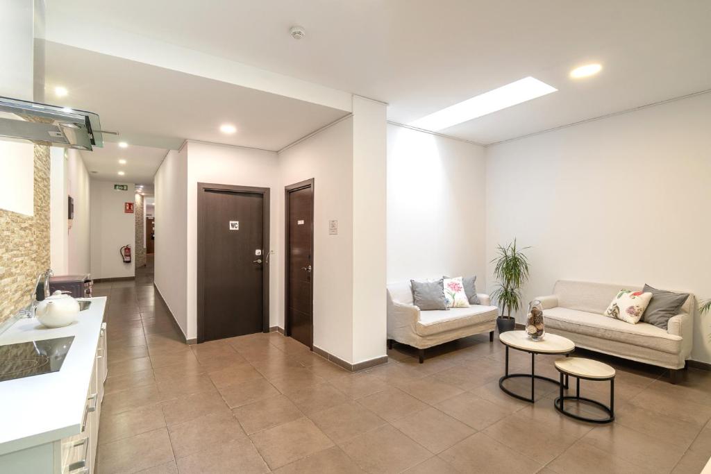 Posezení v ubytování Laramond Barcelona Rooms