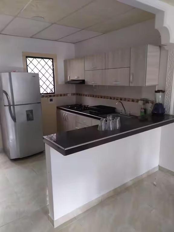 Kuchyň nebo kuchyňský kout v ubytování CASA EN BARRIO Kirpas