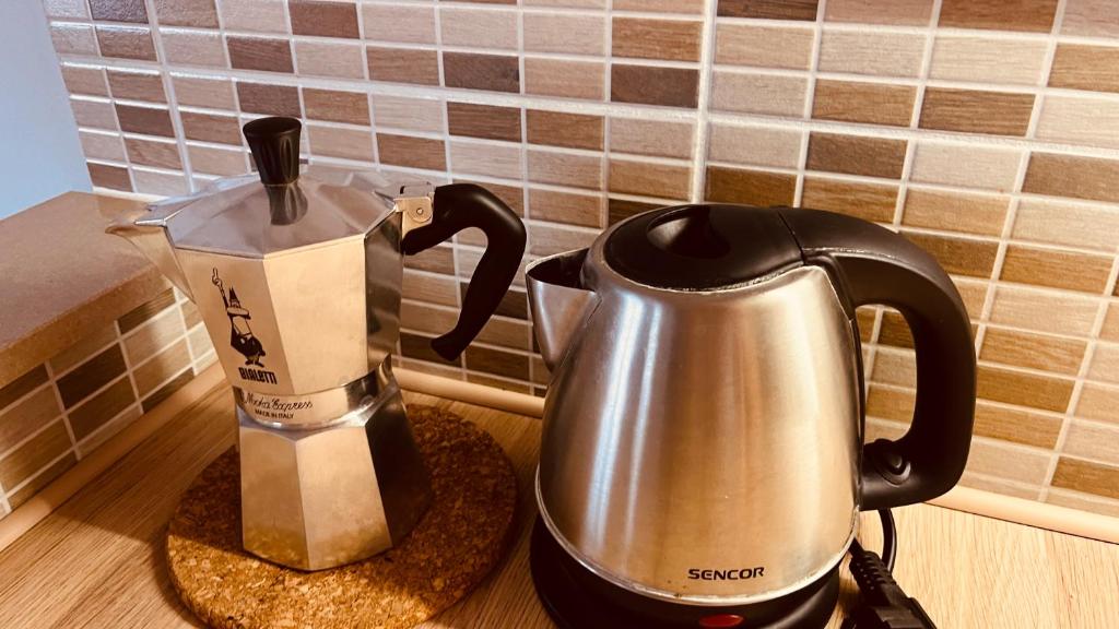 Coffee and tea making facilities at Strigonia Apartman