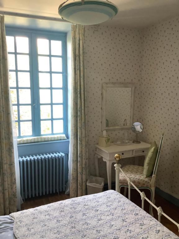 Postel nebo postele na pokoji v ubytování Chambres d'Hôtes Belle Vallee