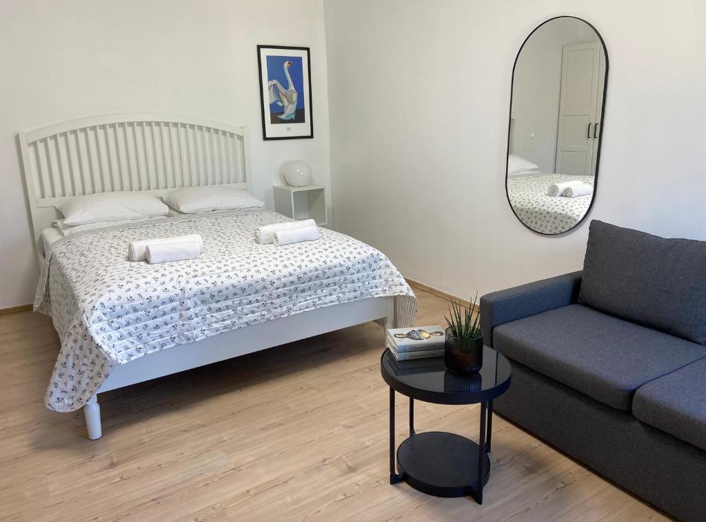 En eller flere senge i et værelse på ASTOS Vila in Palanga