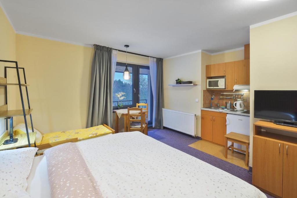 Fotografie z fotogalerie ubytování apartmány Šnek - ať si děti hrají na Benecku