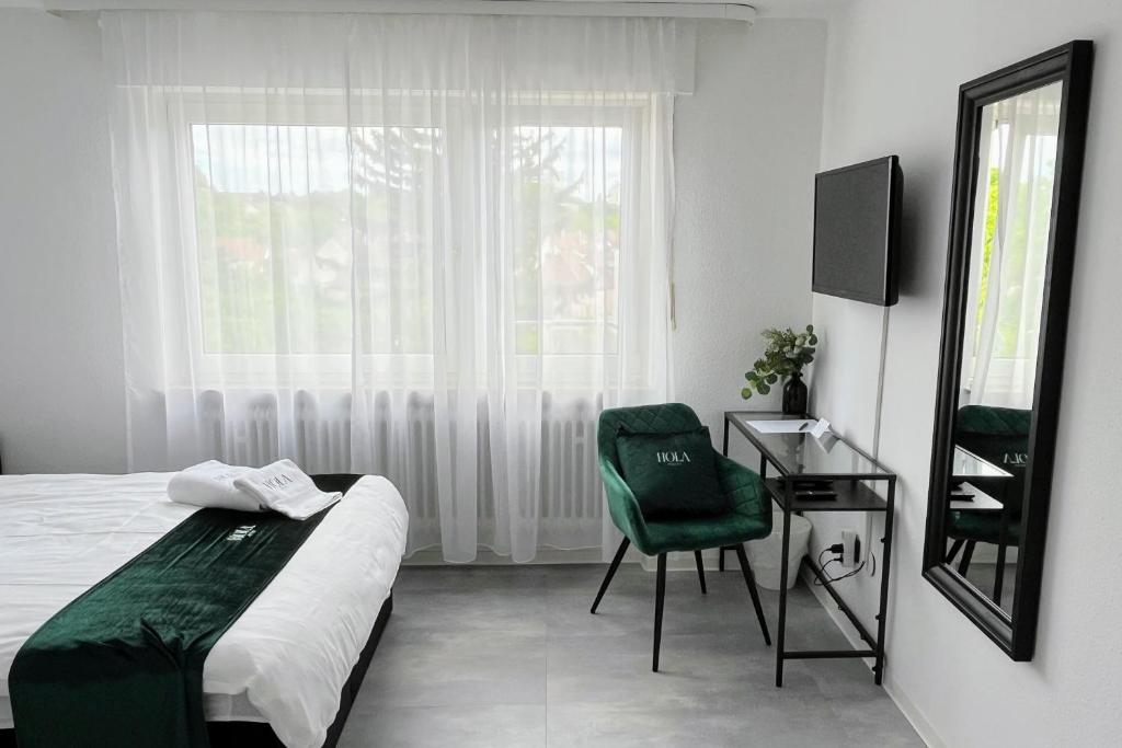 Postel nebo postele na pokoji v ubytování Hola Hotel Stuttgart