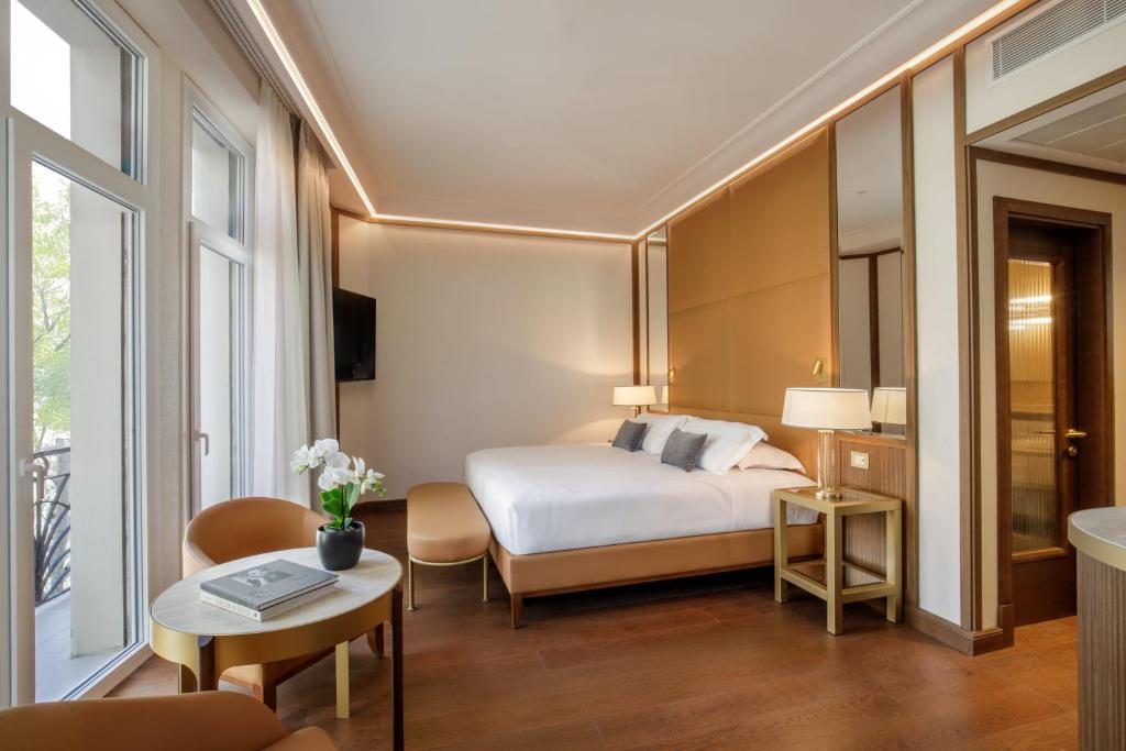 Postel nebo postele na pokoji v ubytování Hotel Imperiale by OMNIA hotels